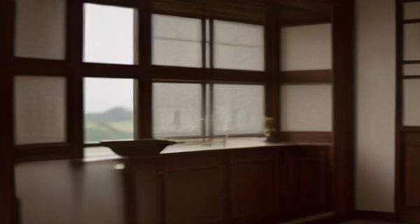 心理咨询室场景中咨询师与青少年面对面交流，温暖灯光下讨论网络成瘾与色情内容接触后的心理修复方法